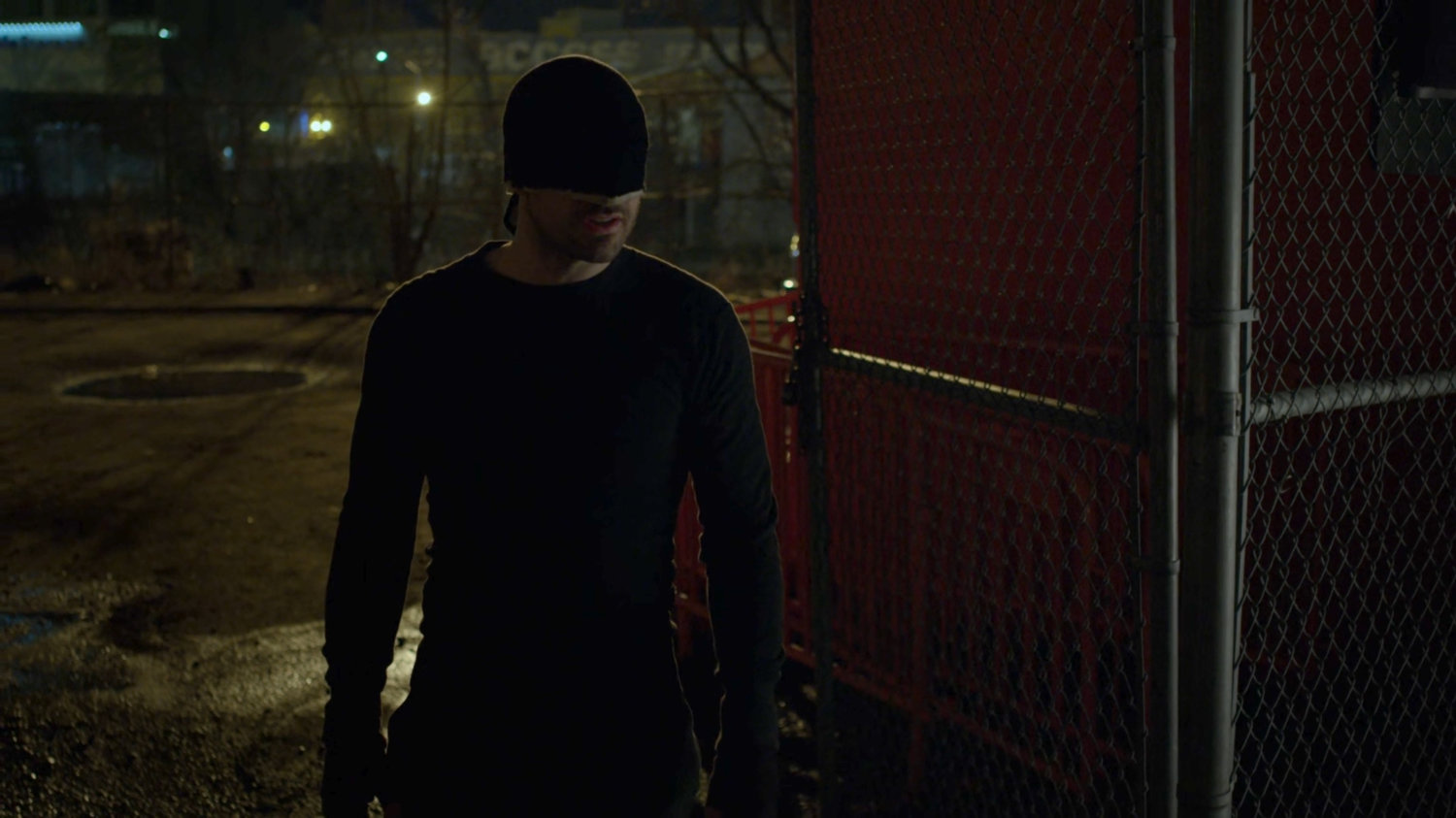 Matt in a dark parking lot.