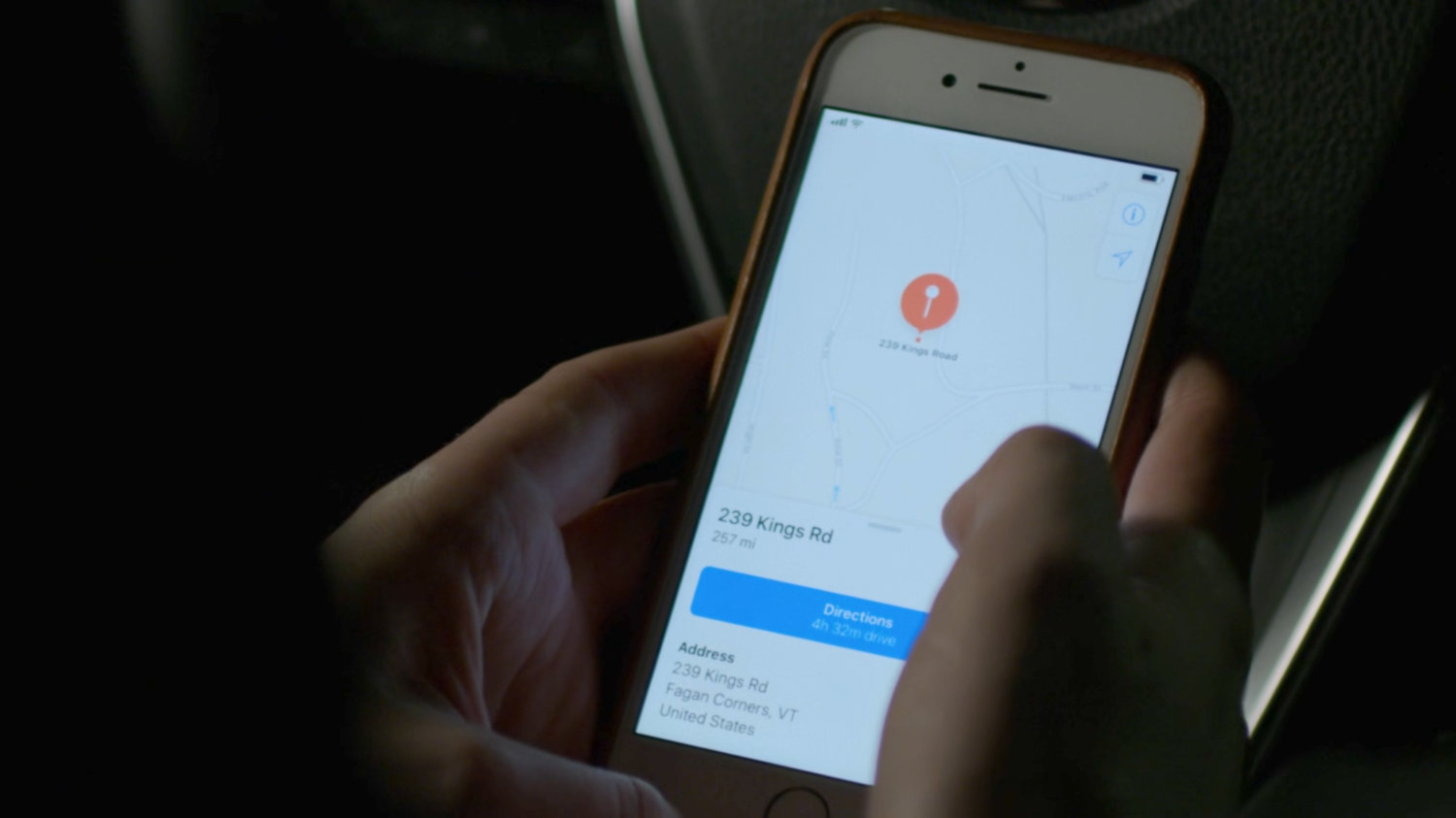 Closeup of map application on Karen's phone, showing 239 Kings Road in Fagan Corners VT.