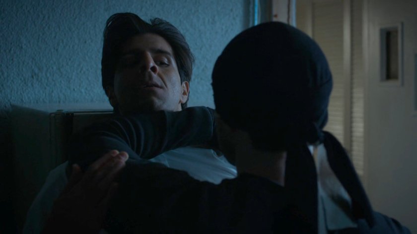 Matt holding Ray by the throat in Nadeem's basement.