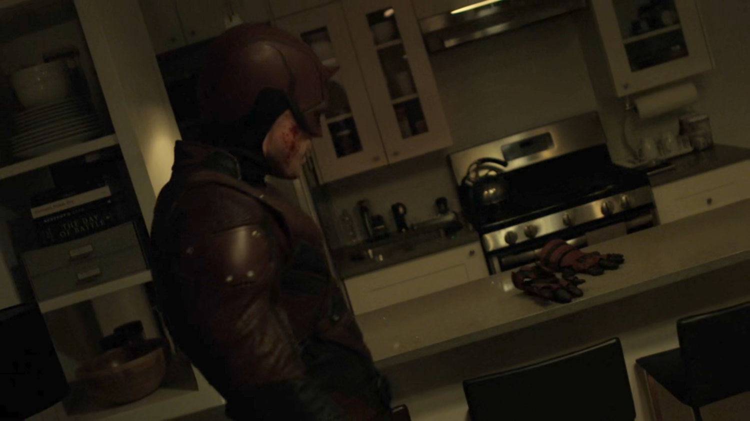 Dex dressed as daredevil in his apartment.