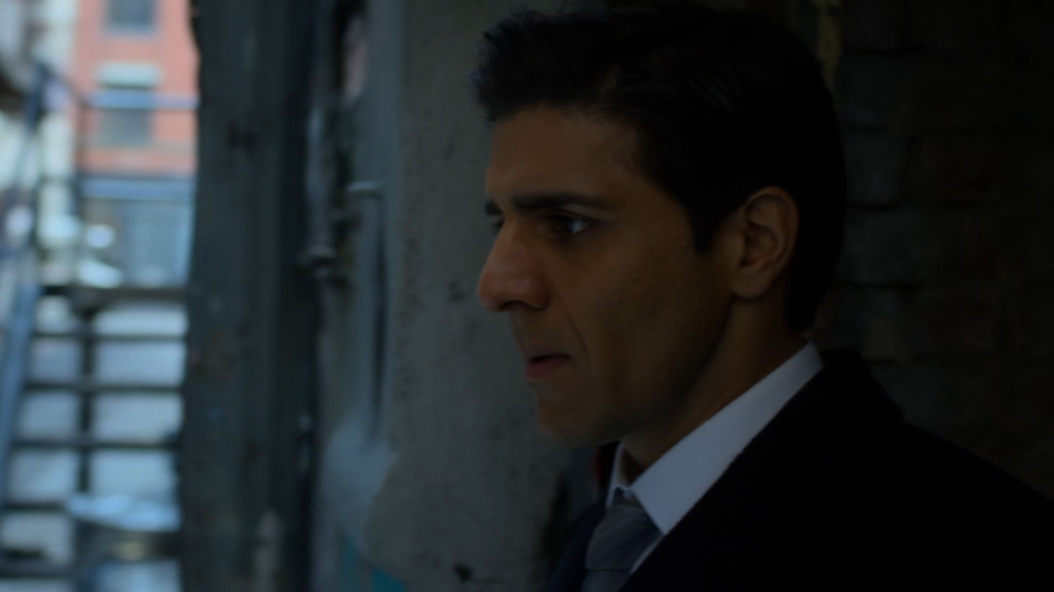 Agent Nadeem in an alley.