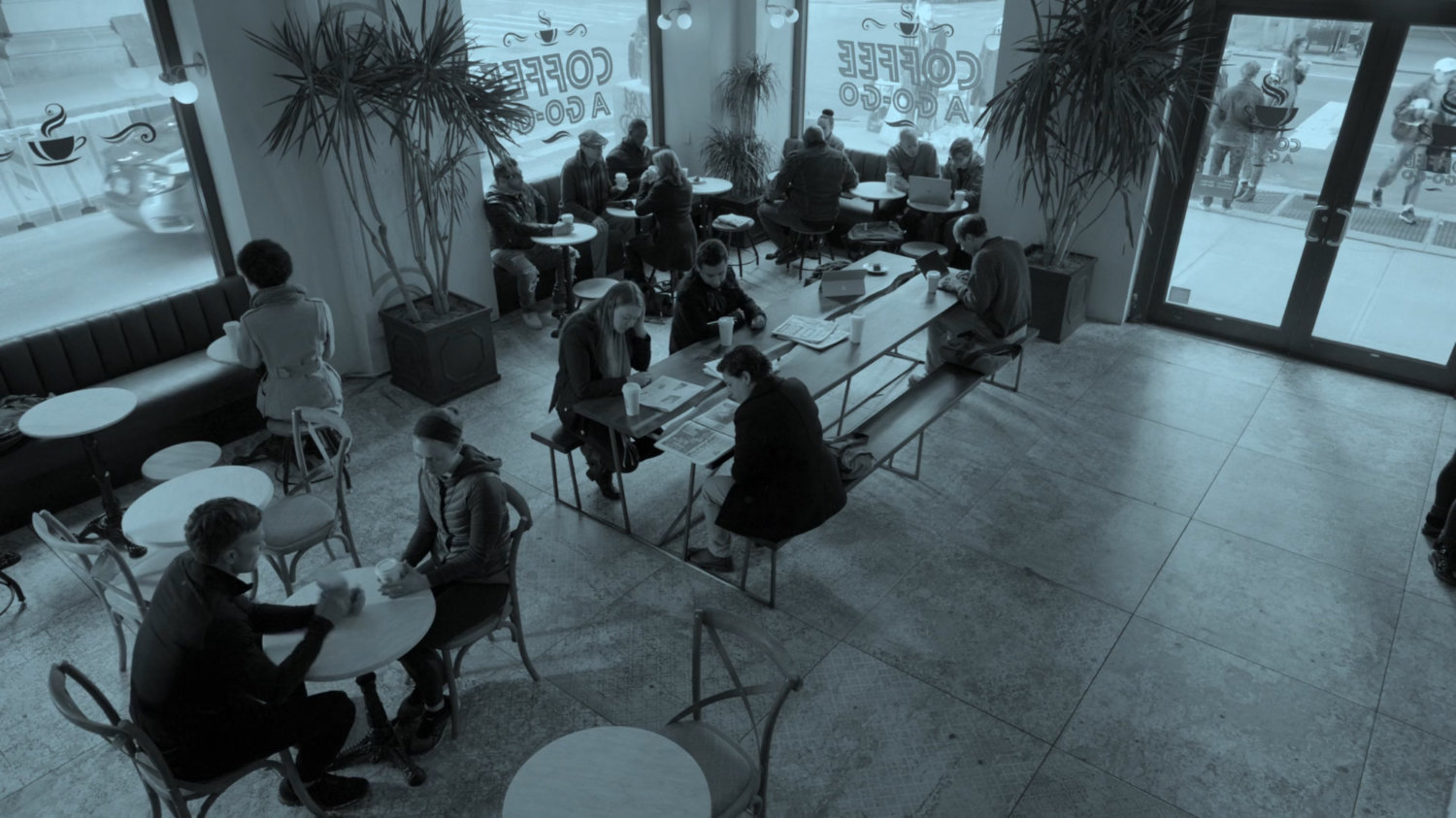 Video footage of Dex and Julie in Coffee A Go Go coffee shop.