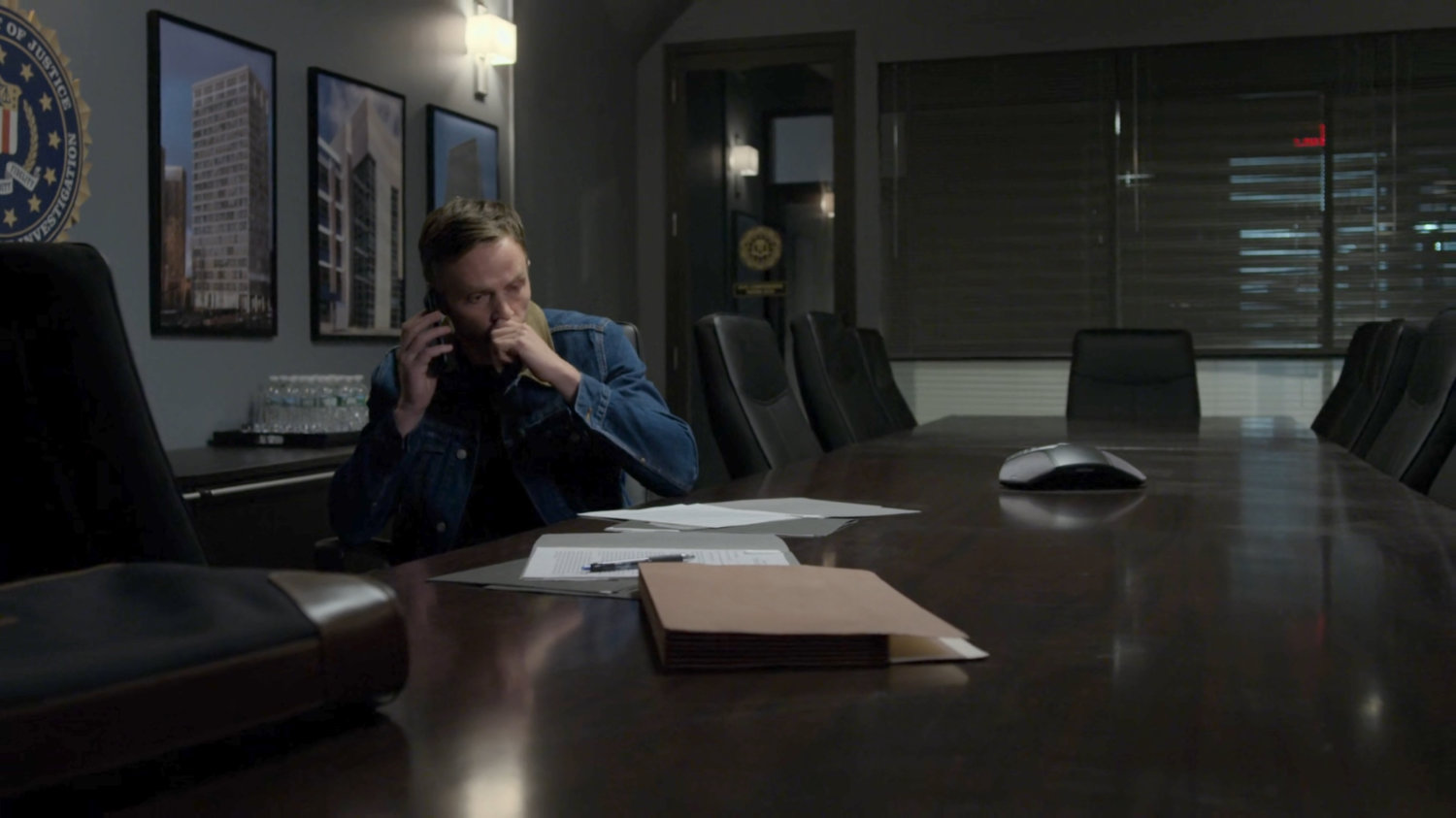 Dex in the FBI Office meeting room.