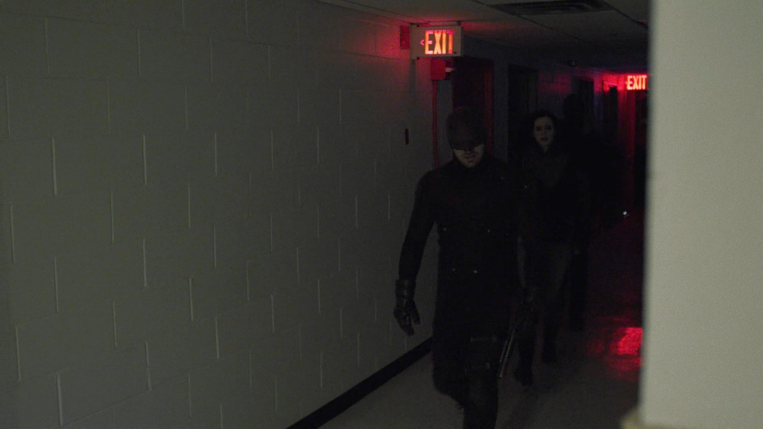 Daredevil and Jessica in a hallway inside Midland Circle.