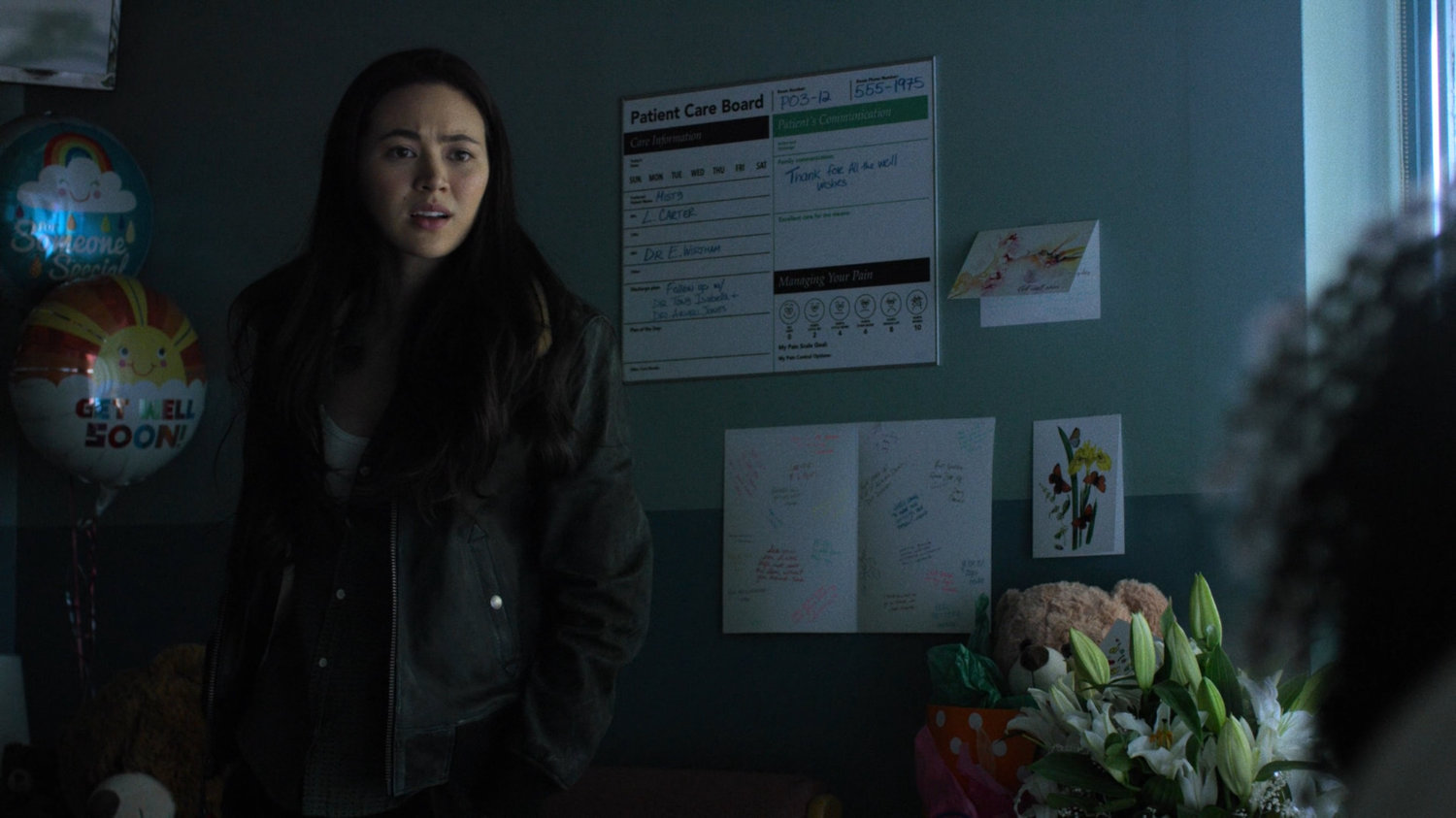 Colleen talking to Misty in a hospital room.
