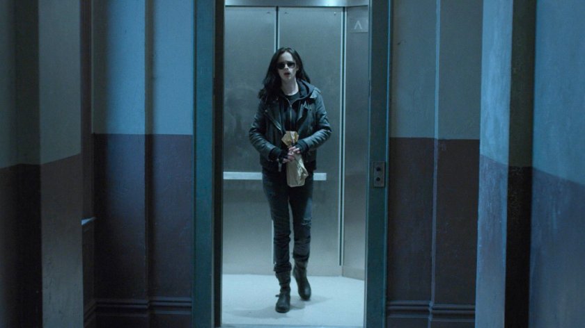 Jessica exiting her elevator outside Alias Investigations.