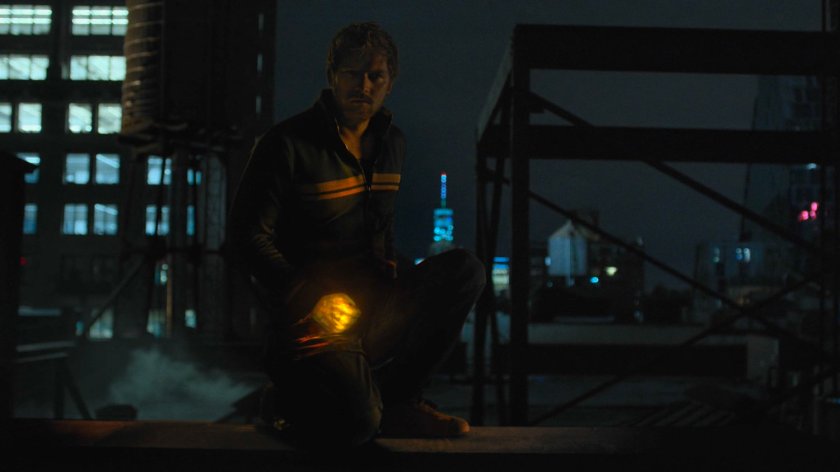 Danny Rand and his Iron Fist on a dark rooftop.