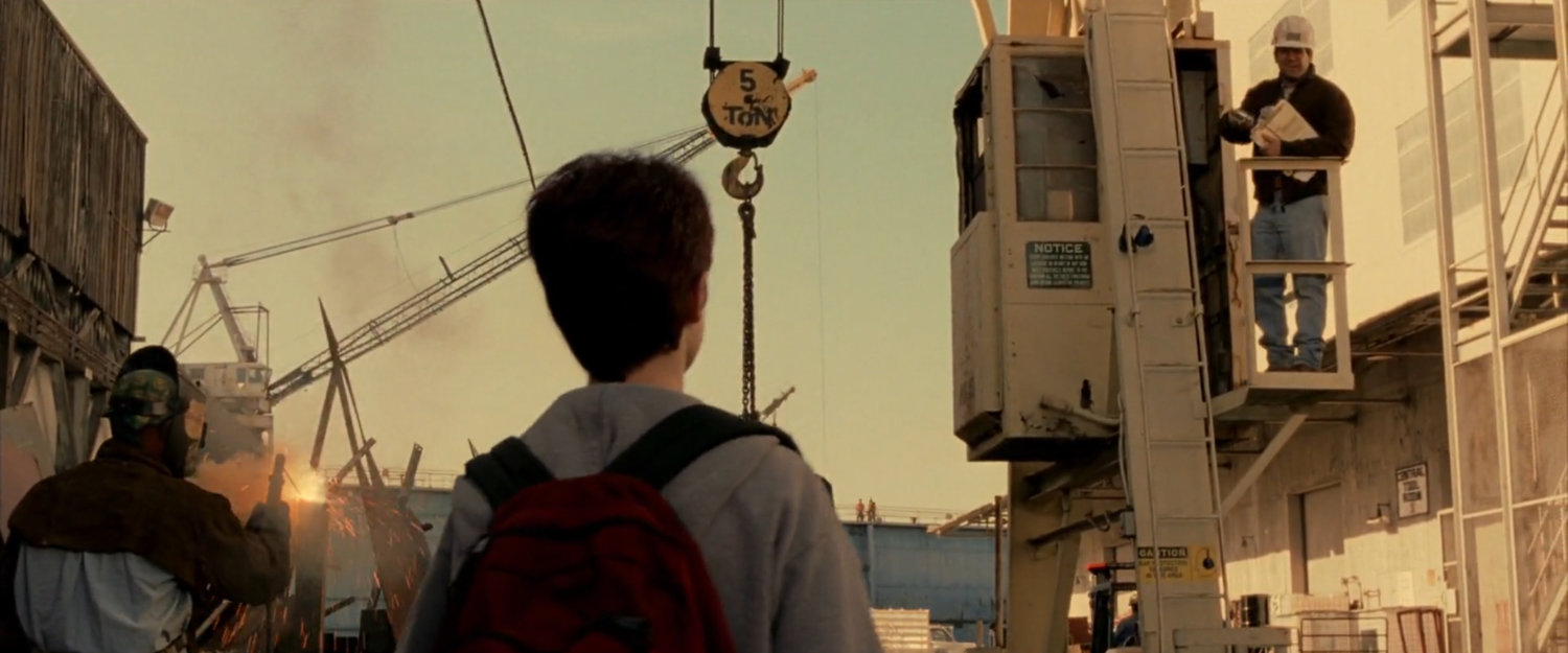 Young Matt asking for his father at Hudson Marine company.