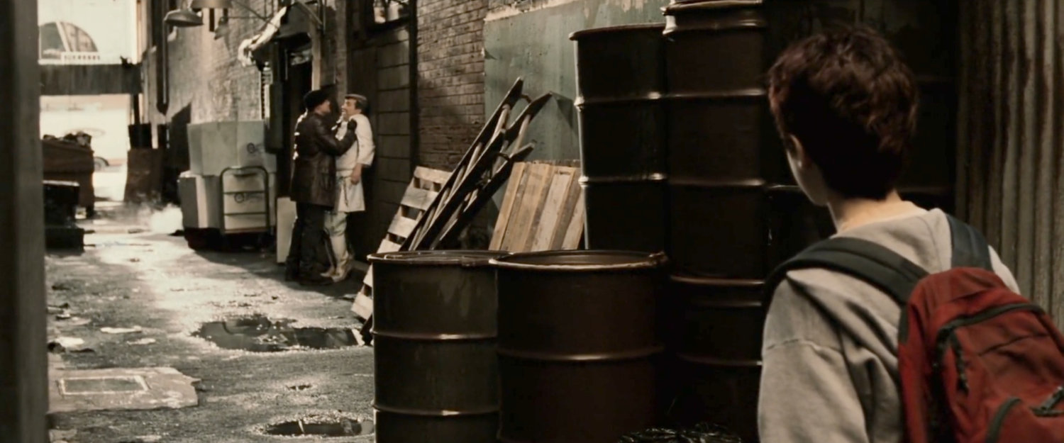 Young Matt witnessing his father beating up man in alley near Hudson Marine company.
