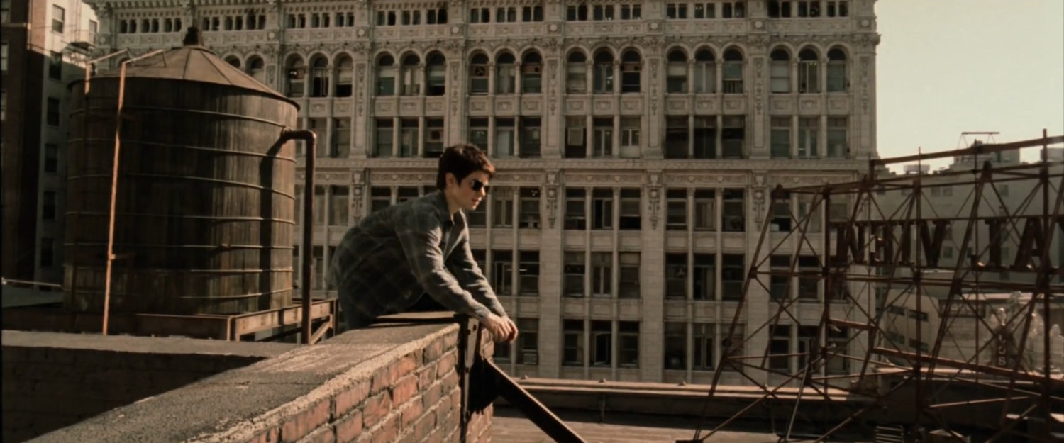 Young Matt feels out an angled pipe on rooftop of Murdock apartment building.