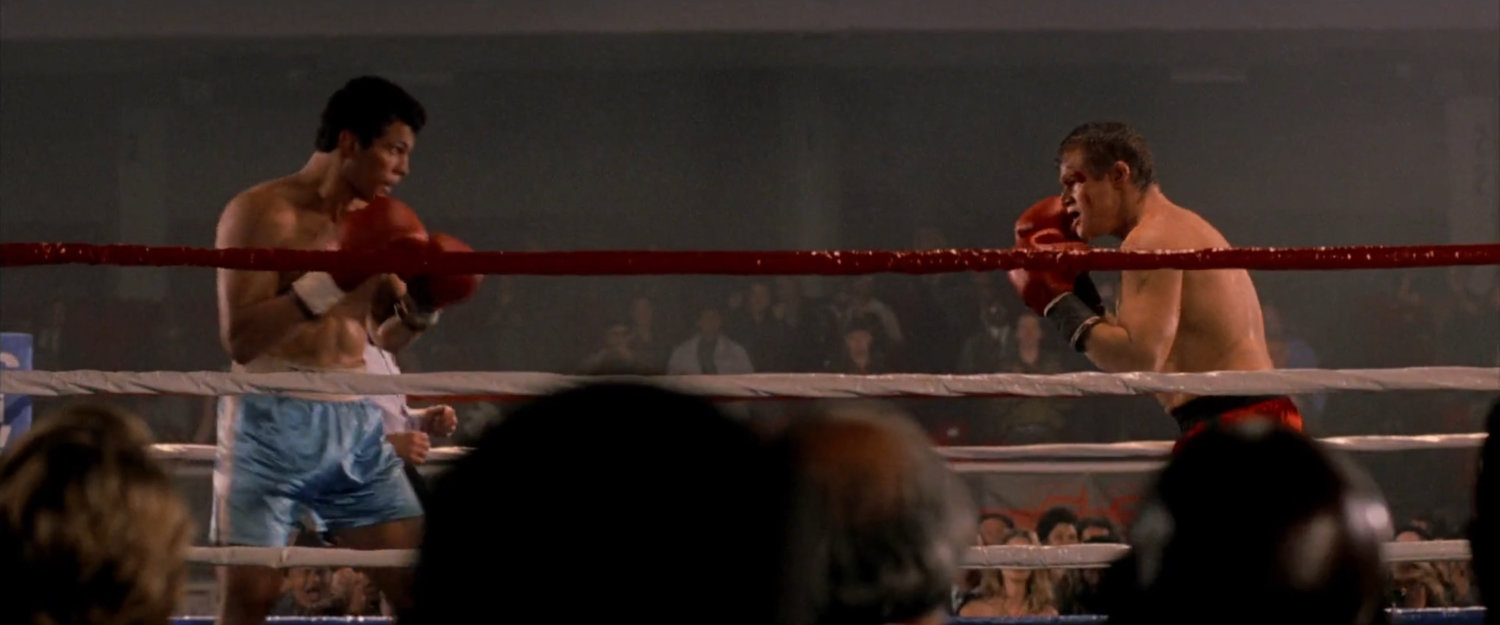 John Romita and Jack Murdock in a boxing ring at the Olympic Auditorium.