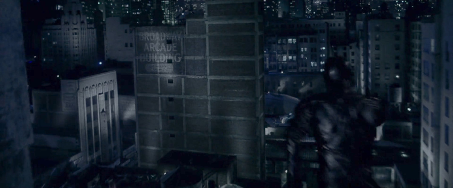 Daredevil leaping from rooftop to rooftop at night.