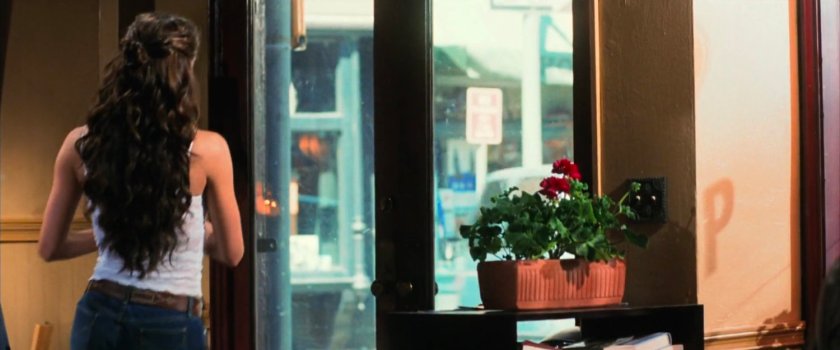 Elektra leaving Jo's Coffee Shop.