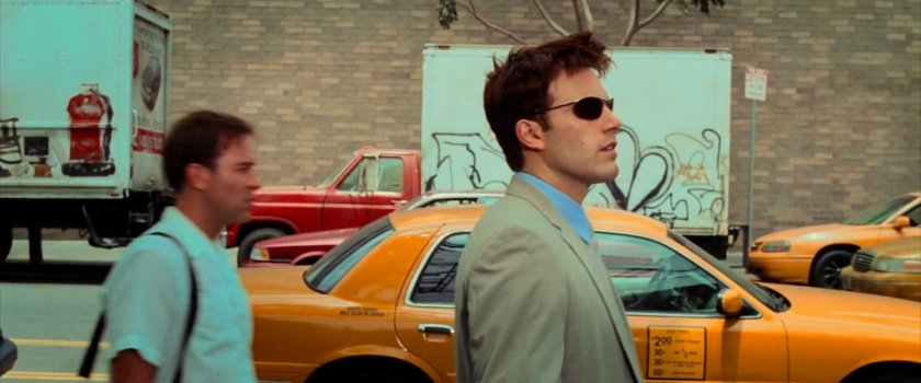 Matt on a sidewalk outside a New York playground.