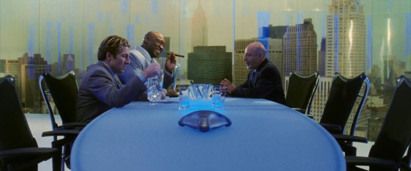 Wilson Fisk and Wesley meet with Nikolas Natchios in Fisk's office.