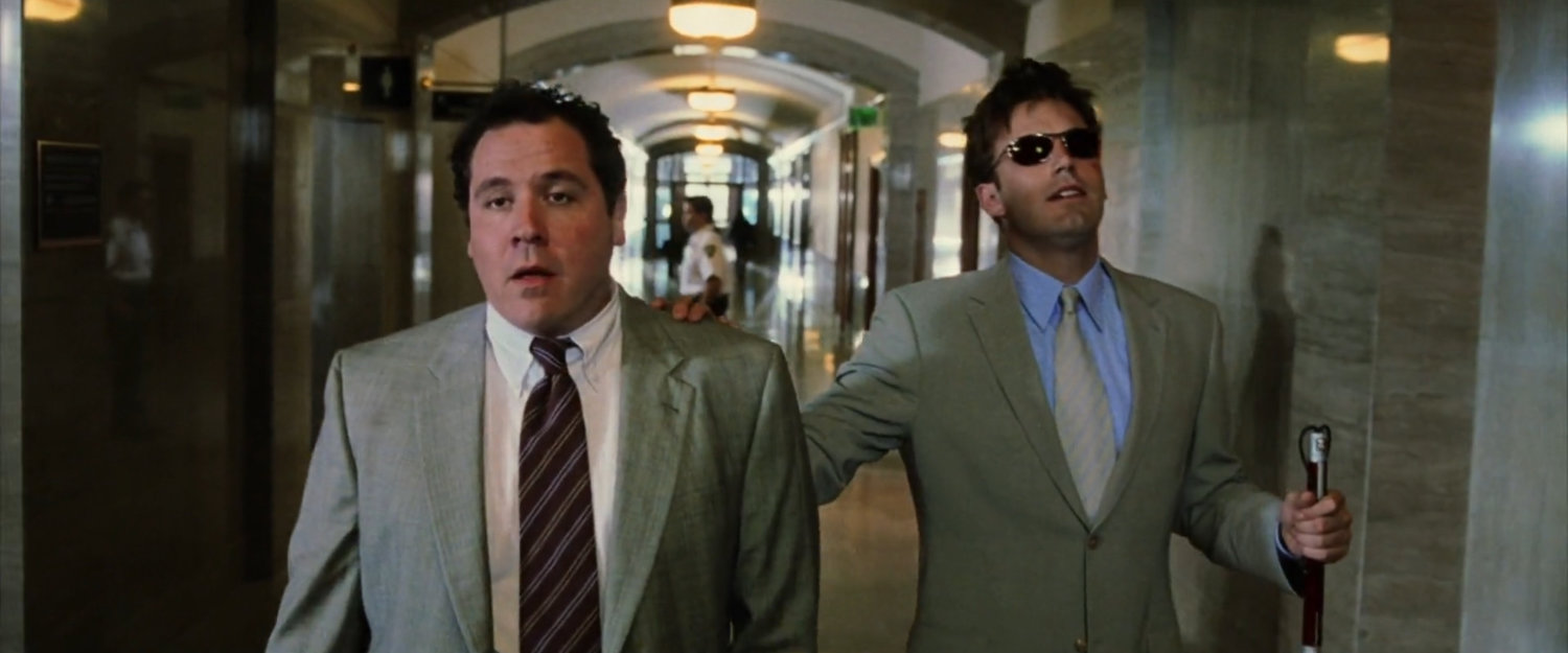 Foggy and Matt in a courthouse hallway.
