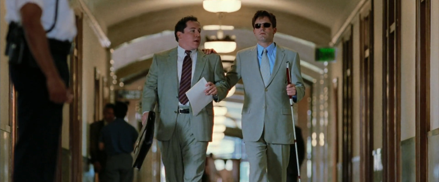 Foggy and Matt in a courthouse hallway.