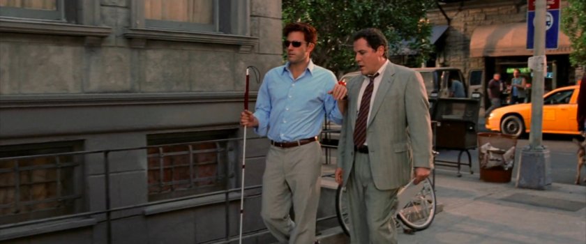 Matt and Foggy walking along a New York sidewalk.