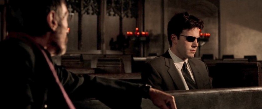 Matt and Father Everett in the Church of the Holy Innocents.