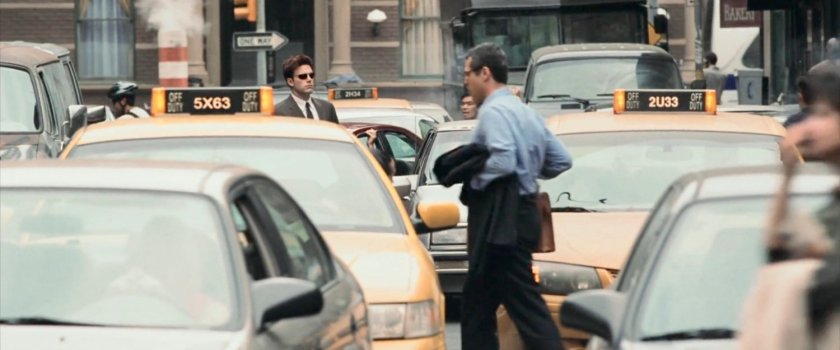 Matt crossing a busy New York street.