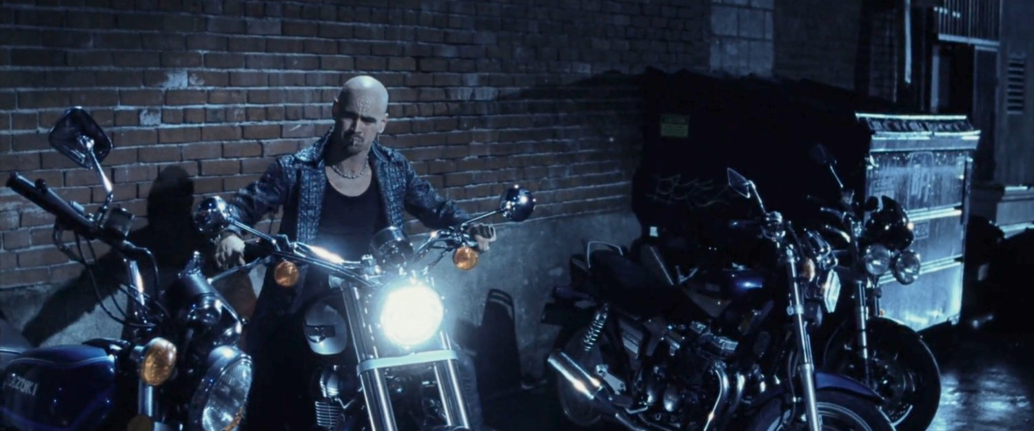Bullseye on a motorcycle in a dark alley.