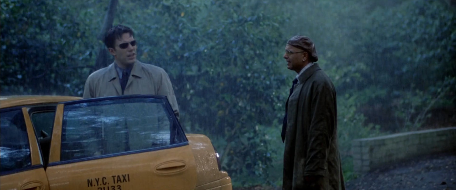 Matt getting into cab at a cemetery with Ben Urich.
