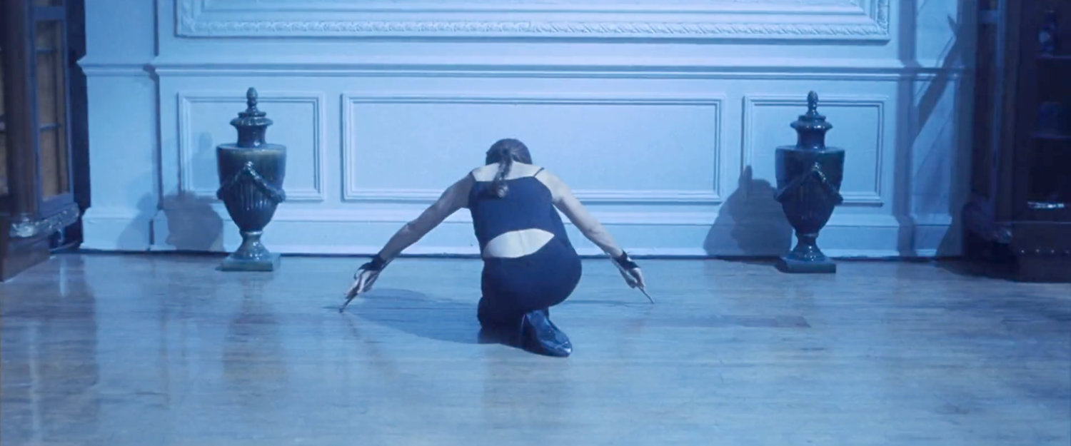 Elektra training in her mansion.