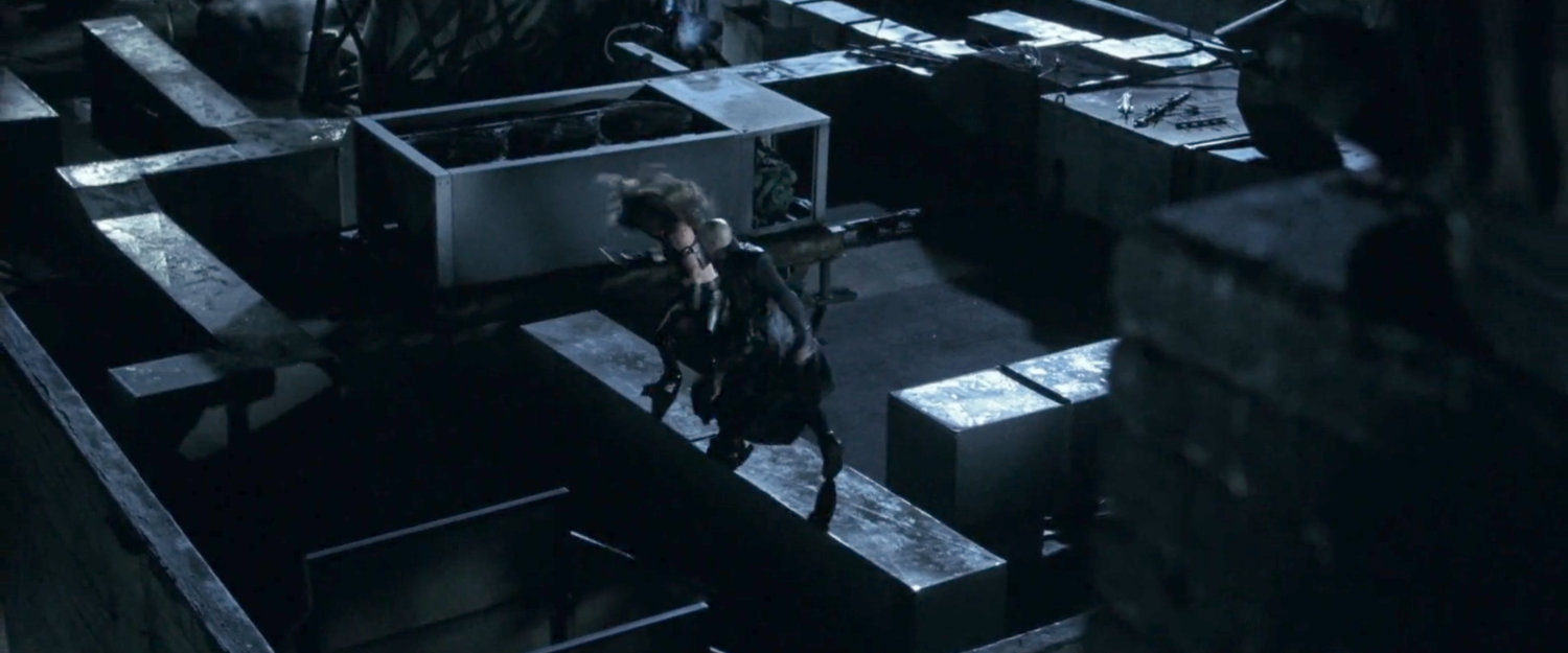 Elektra and Bullseye fighting on a rooftop.