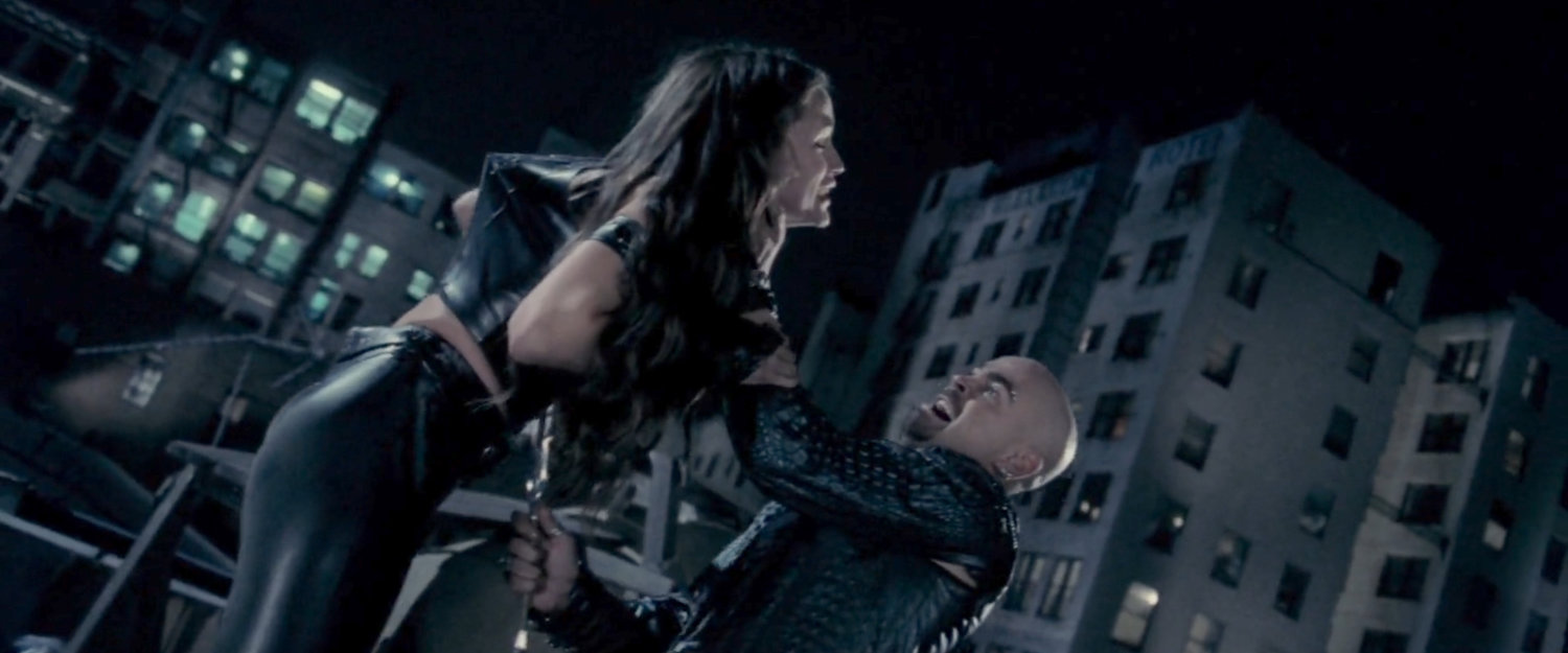 Bullseye stabbing Elektra on a rooftop.