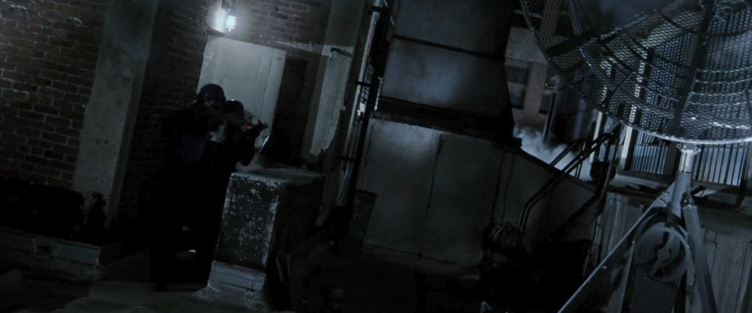 SWAT team storms onto a rooftop.