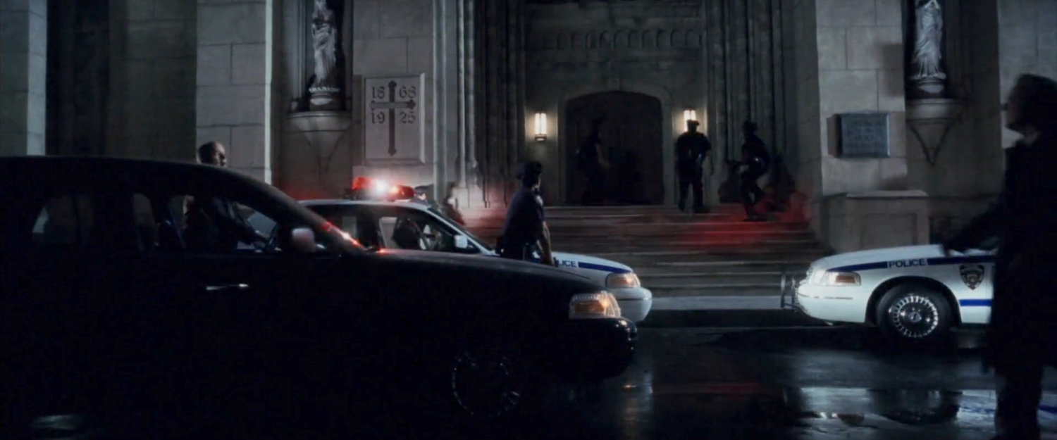 Police arriving outside the Church of the Holy Innocents.