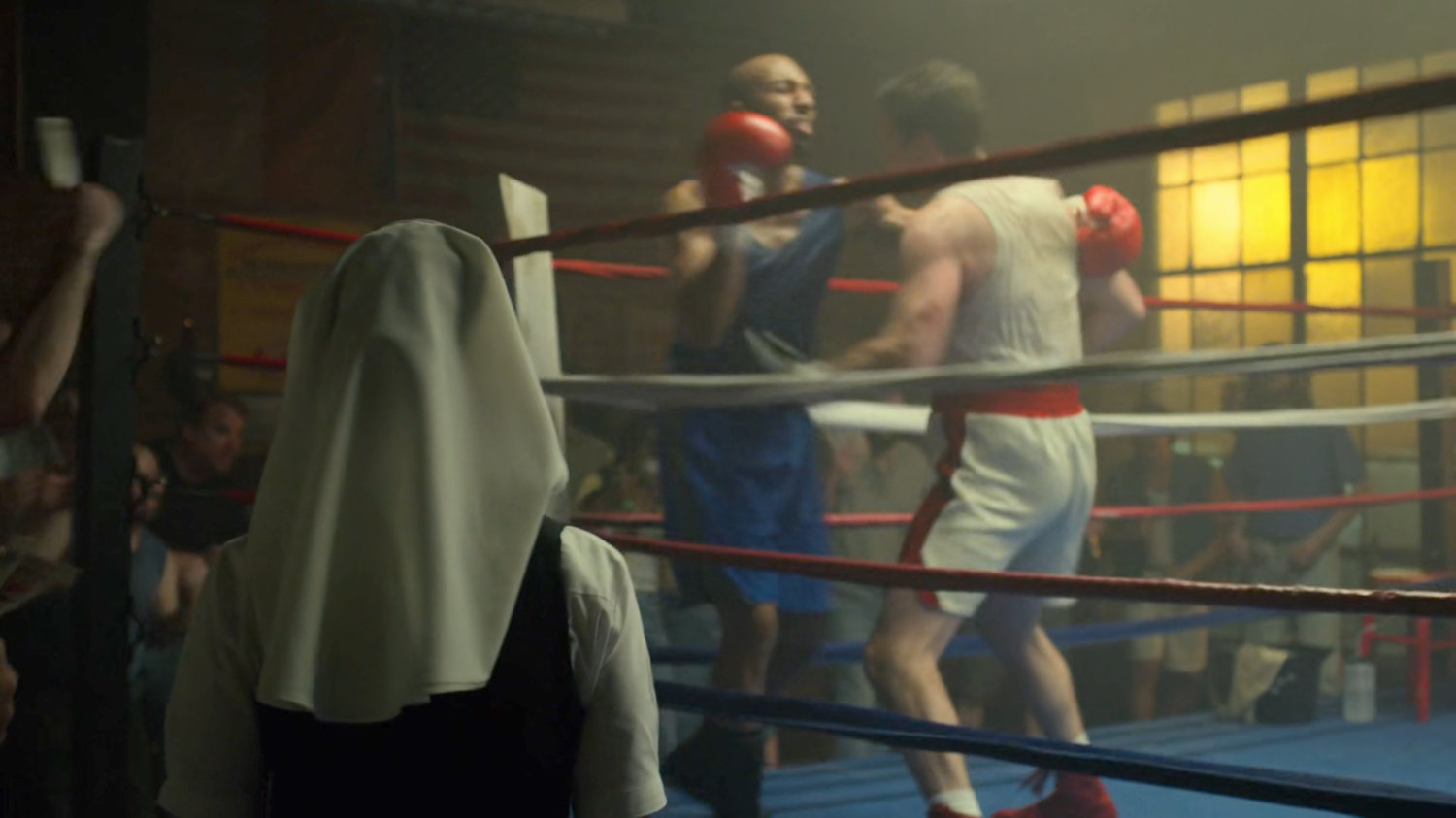 Novitiate Maggie watches Jack Murdock box at Fogwell's Gym.
