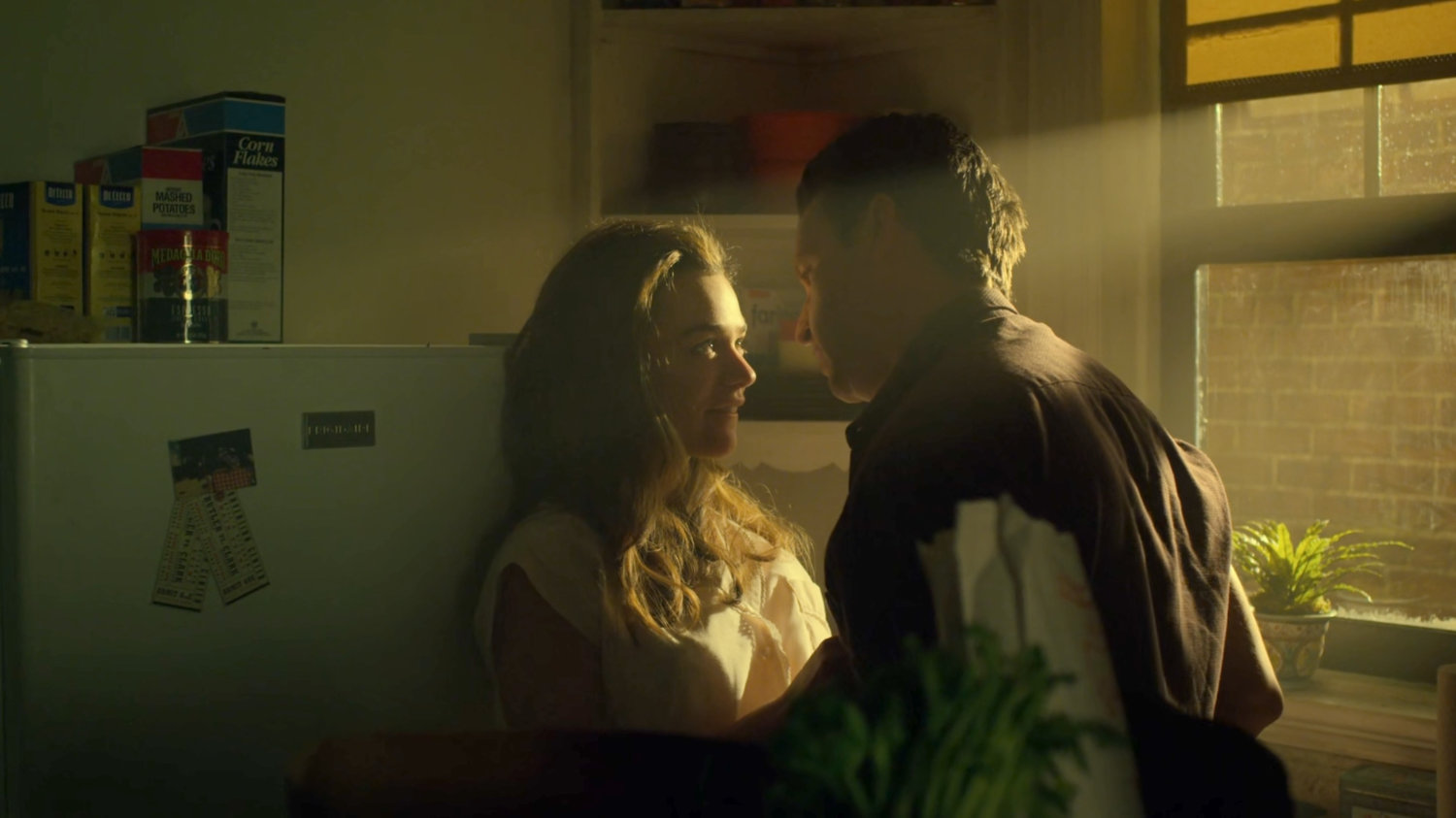 Maggie and Jack Murdock in the kitchen of their apartment.