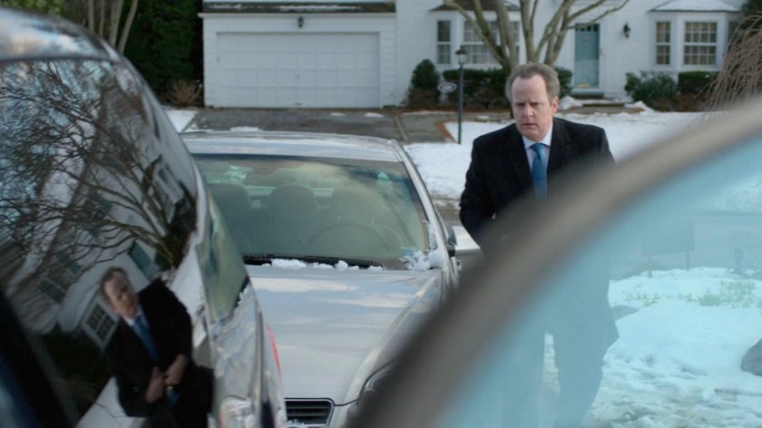 Agent Winn in front of SAC Hattley's house.