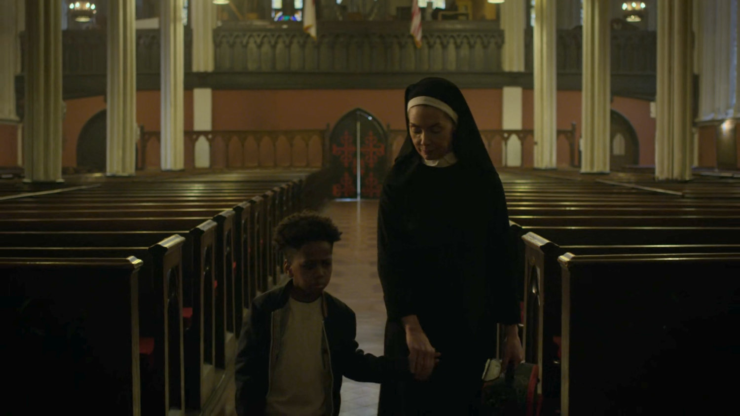 Sister Maggie and a young boy in Clinton Church.