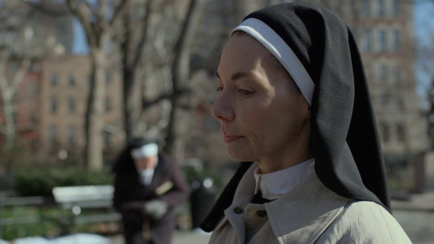 Sister Maggie in a park by Clinton Church.