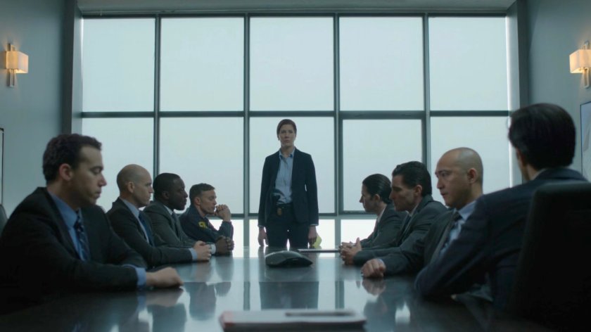 SAC Hattley stands by the eight corrupted Agents in the FBI meeting room.