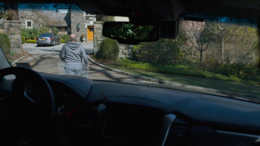 Two FBI SUVs follow Everett Starr towards his mansion.