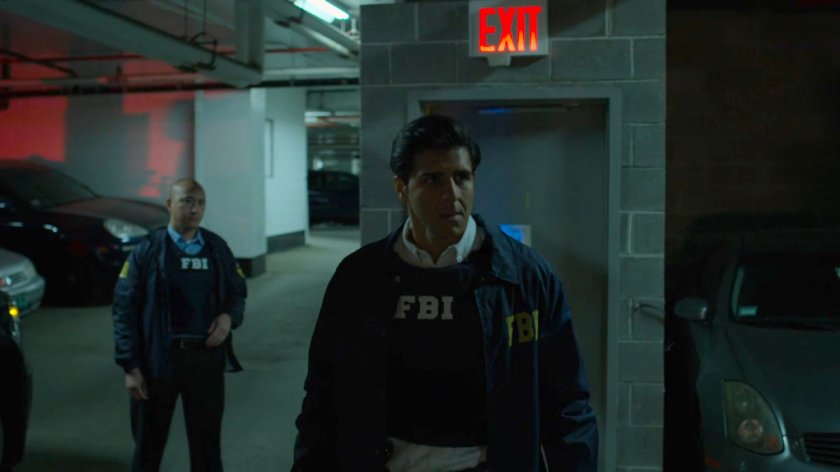 Agents Arinori and Nadeem in the Presidential Hotel parking garage.