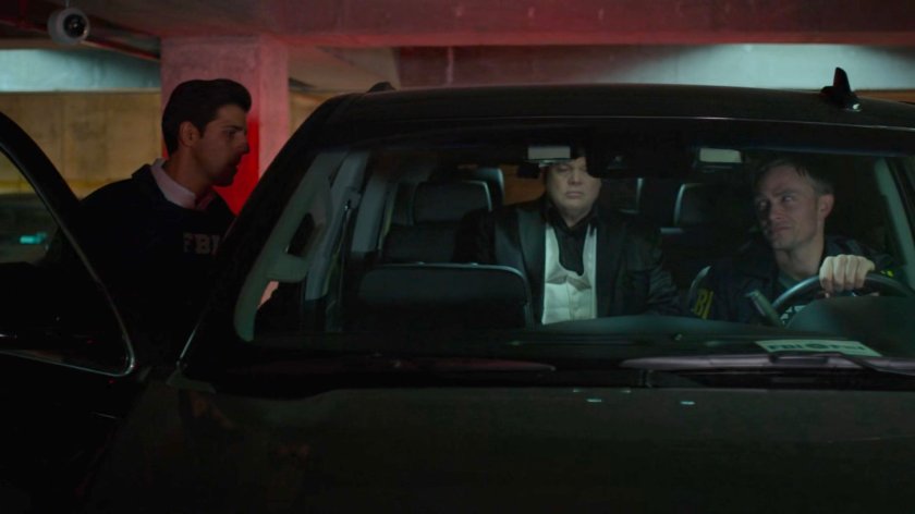 Agent Nadeem gets into an SUV with Fisk and Dex in the Presidential Hotel parking garage.