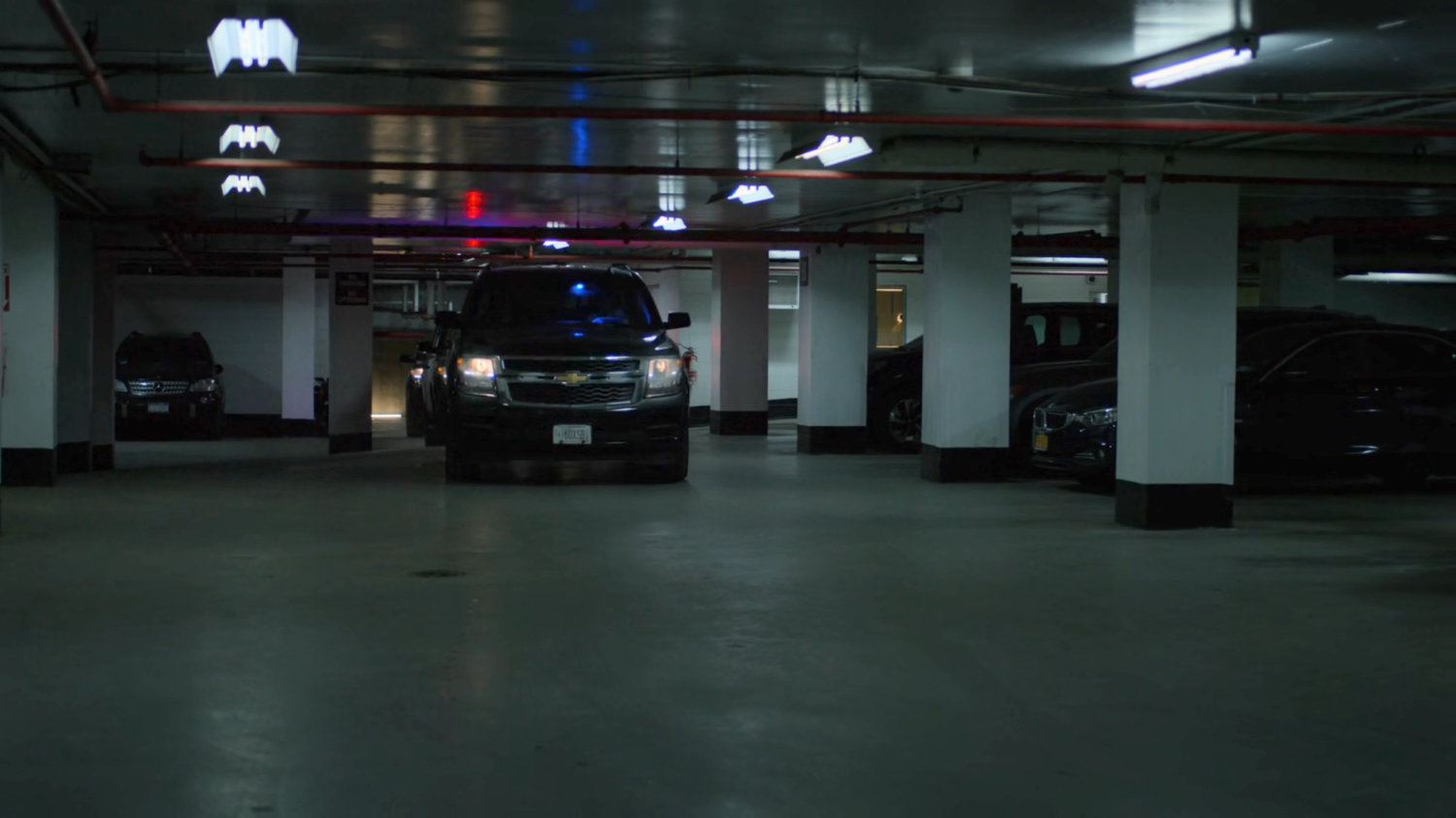 FBI SUVs in the Presidential Hotel parking garage.