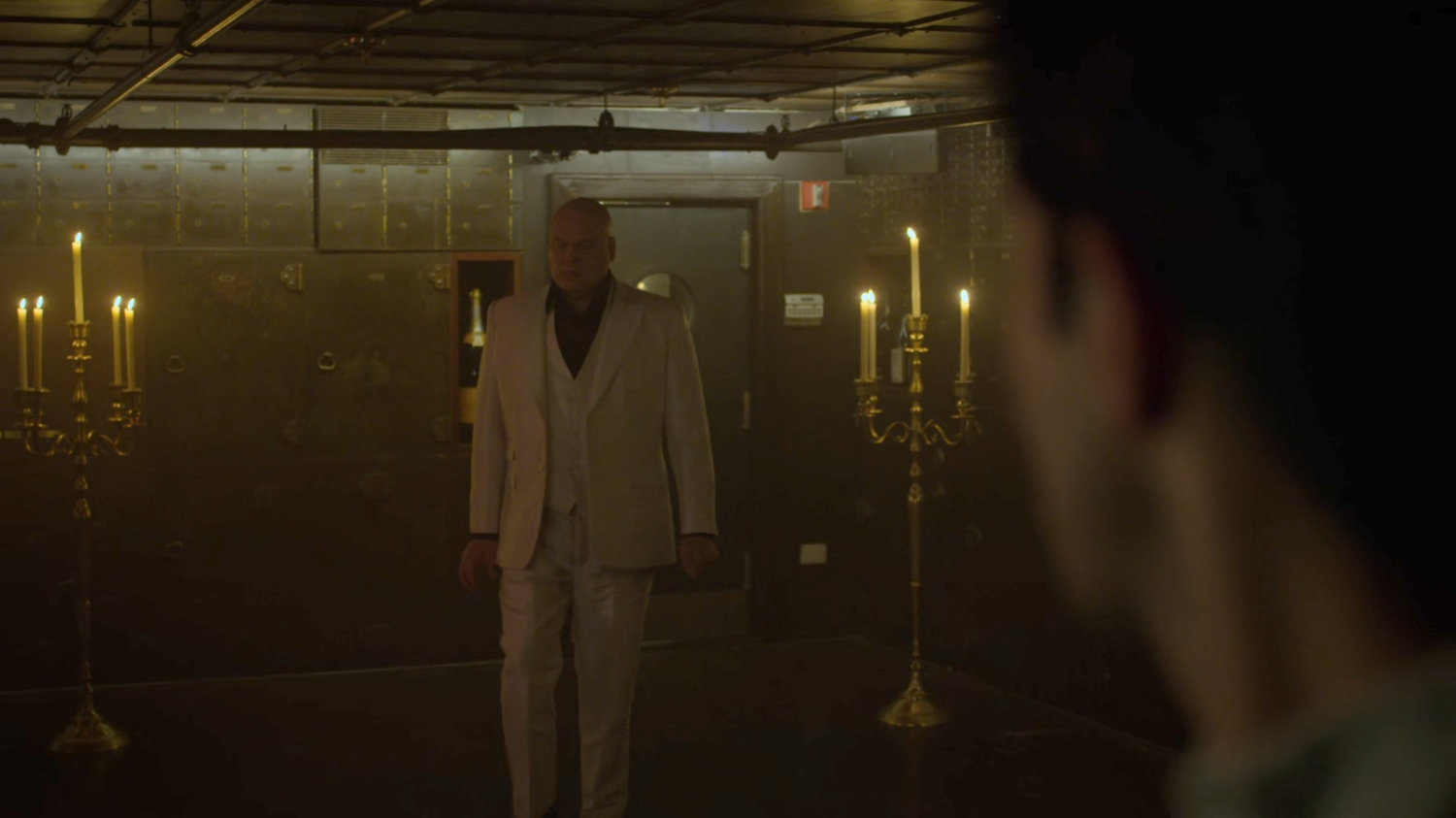 Kingpin enters the Red Fish Blue Restaurant.