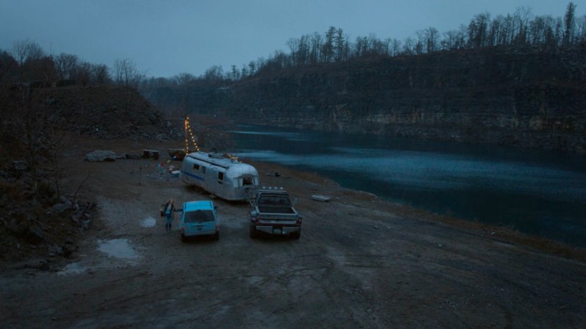 Karen getting in her pickup parked outside a silver trailer at a quarry in Vermont.