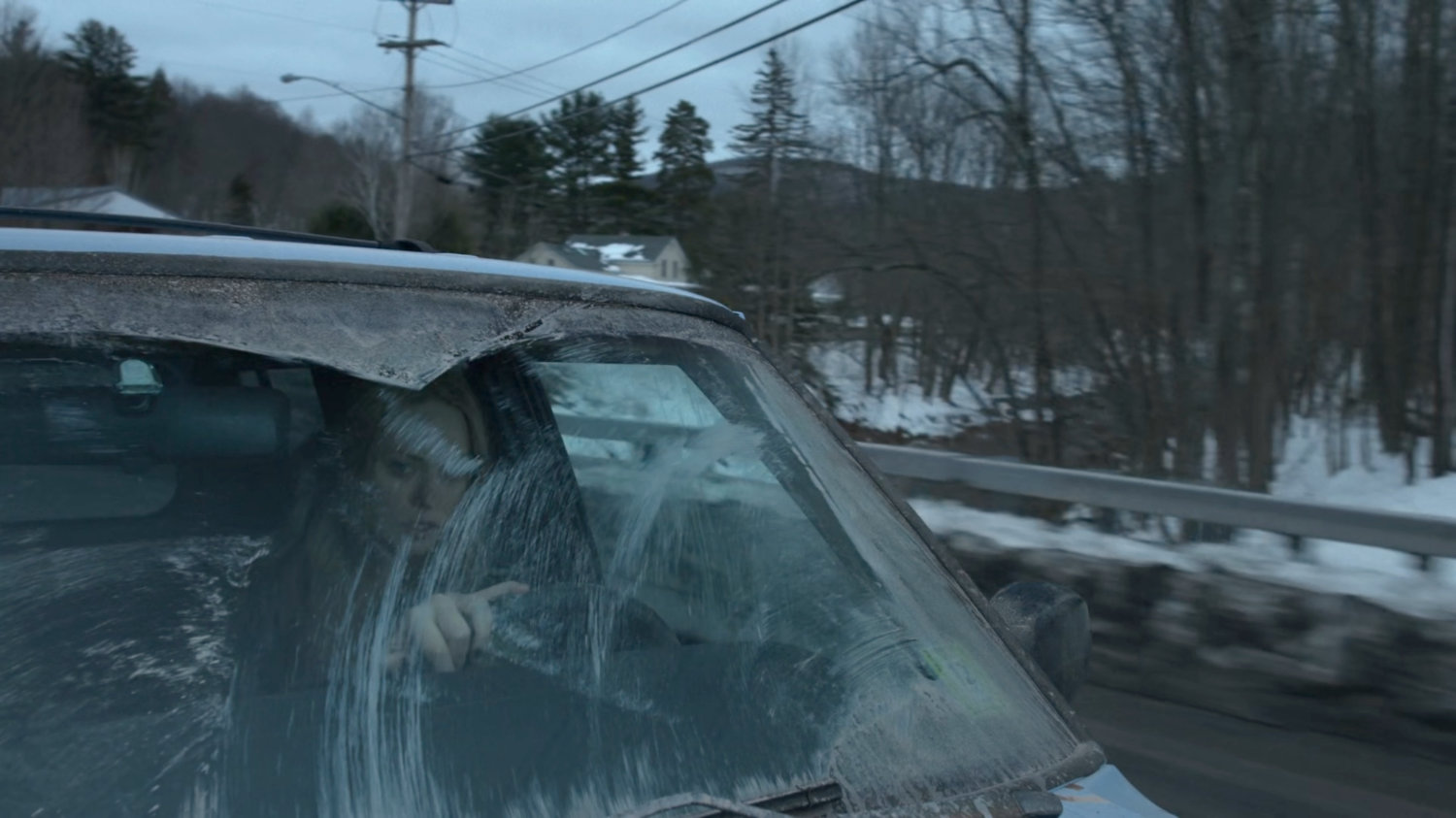 Karen driving on a snowy Vermont road.