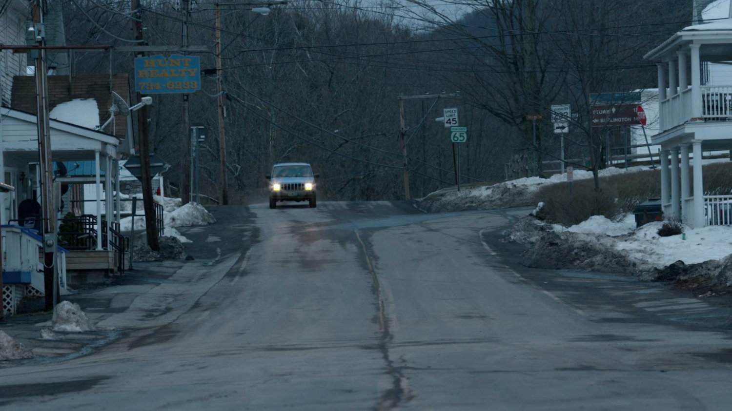 Karen's blue truck driving through Fagan Corners, Vermont.