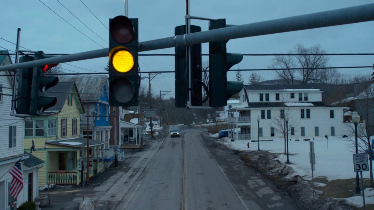 Karen's blue truck driving through Fagan Corners, Vermont.