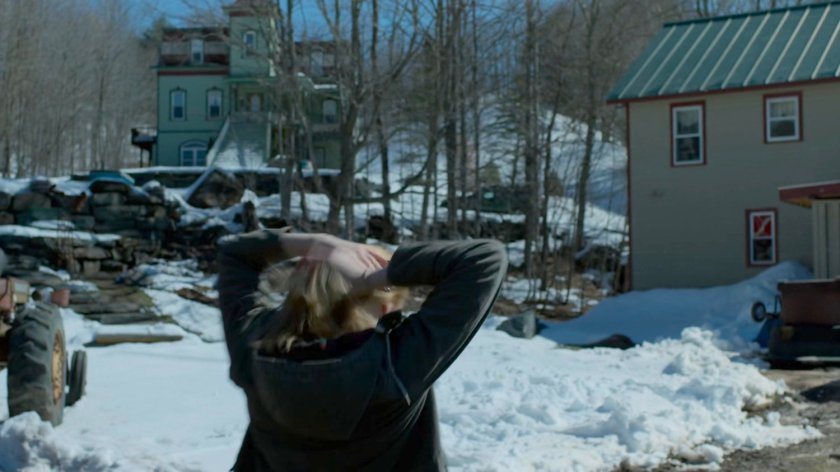 Karen walking across Penny's Place parking lot.