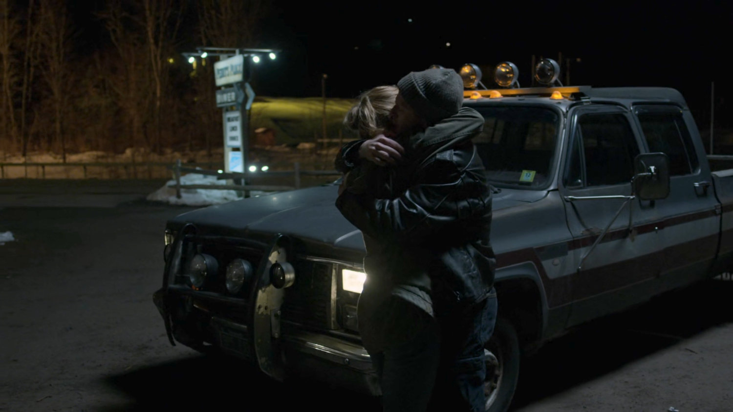 Karen hugging Todd in the parking lot of Penny's Place.