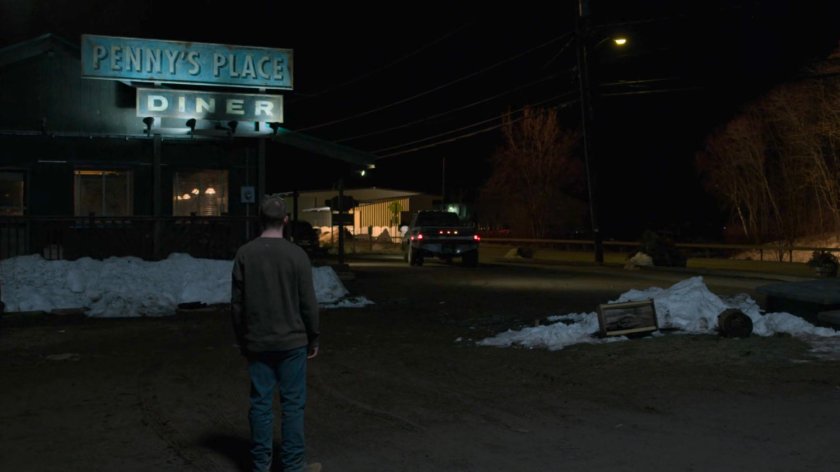 Kevin watching a pickup drive away from the parking lot at Penny's Place.