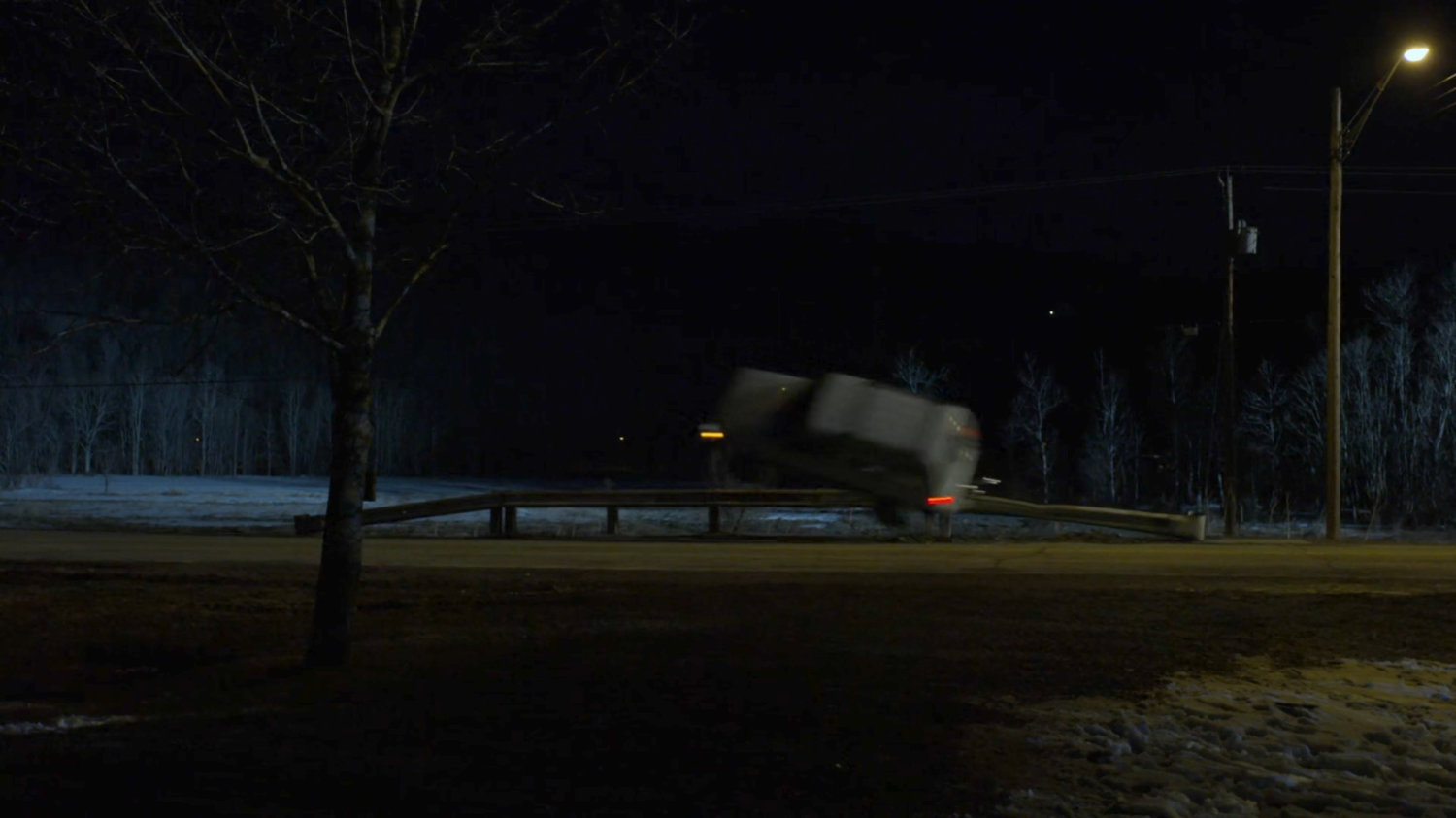 Karen's truck flipping on a dark Vermont road.